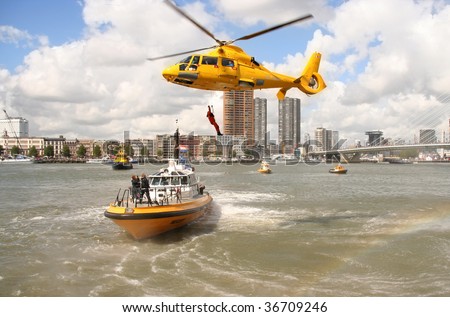 ROTTERDAM - SEPTEMBER 5: Local rescue authority personnel demonstrate rescue operation at sea at the annual World Harbor Days September 5, 2009 in in Rotterdam, Holland.