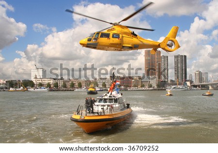 ROTTERDAM - SEPTEMBER 5: Local rescue authority personnel demonstrate rescue operation at sea at the annual World Harbor Days September 5, 2009 in in Rotterdam, Holland.