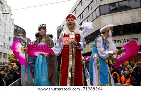 THE HAGUE, HOLLAND - FEBRUARY 5: Chinese ladies at the Chinese Newyear parade in The Hague, Holland on february 5, 2011.