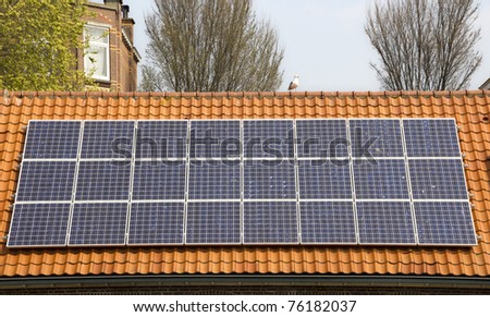Solar panels on the roof of a city farm in The Hague, Holland