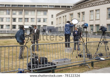 THE HAGUE, HOLLAND - MAY 27: International reporters at the trial for war crimes of Serbian ex-general Mladic at the Yugoslavia Tribunal in The Hague, Holland on May 27, 2011
