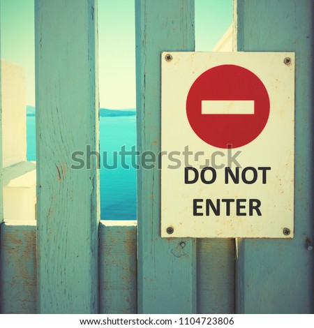 Do not enter sign on a wooden gate. Vintage style