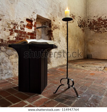 Church interior with open Bible