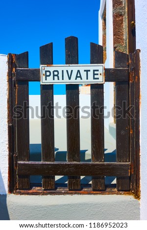 Closed wooden wicket with private sign