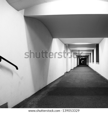 Perspective of long corridor. Black and white image