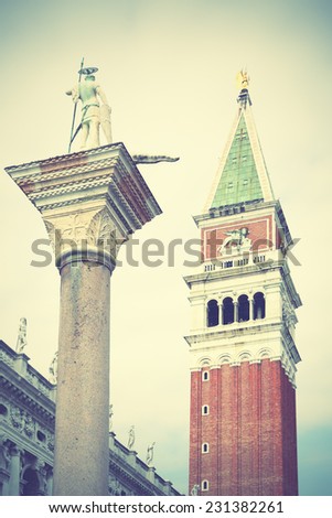 Campanile and statue of St.Theodore on San Marco square, Venice, Italy.  Instagram style filtred image