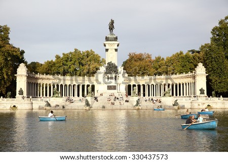 MADRID, SPAIN - SEPTEMBER 23, 2015: Pond and Monument to Alfonso XII in the Parque del Buen Retiro in Madrid