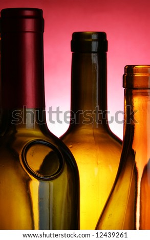 Bottle-necks close-up over red background