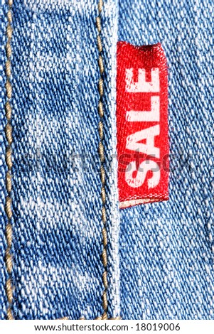 Blue jeans and red label  with word SALE