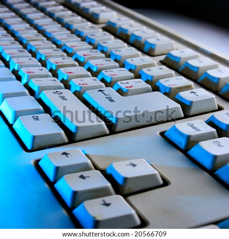 Keyboard close-up in blue light