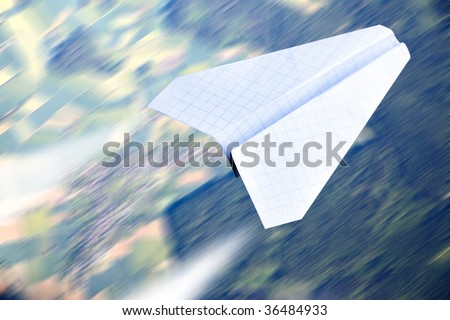 Aerial view in motion blur and paper plane flying