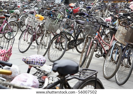 Plenty bicycles at parking lot in Beijing, China