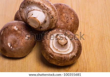 An arrangement of portobella mushrooms ready to cook with