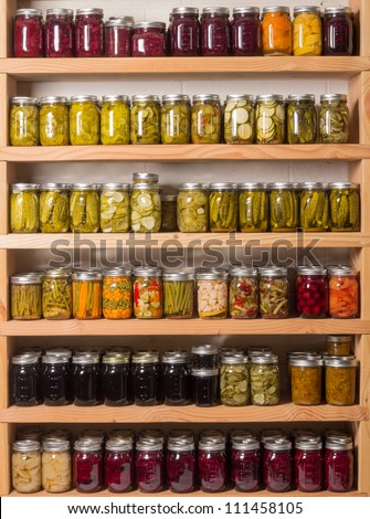Shelves of homemade preserves and canned goods