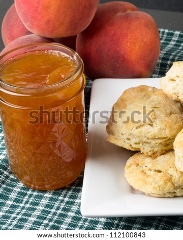 Biscuits with fresh peach jam or jelly with peaches