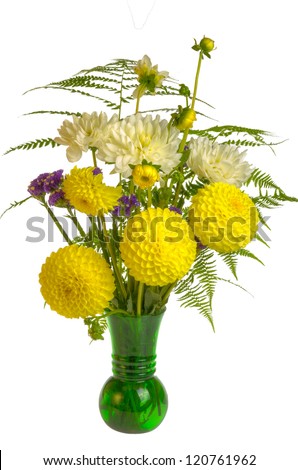 Flower arrangement with ferns and flowers in green vase