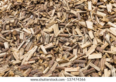 A large pile of firewood split and ready to use