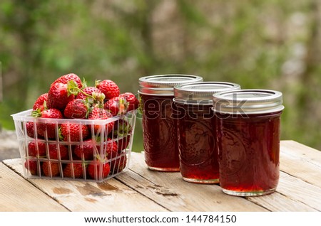 Fresh homemade strawberry jelly or jam in jars