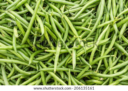 Green beans or snap beans in a bulk display at the market