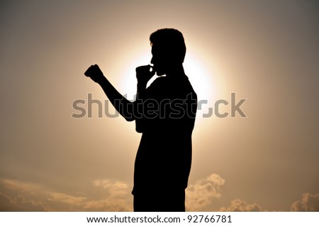 Silhouette of boxer action