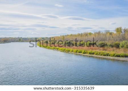 Autumn landscape of the Bow River in Fish Creek Park, Calgary. Alberta.