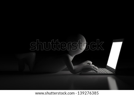 Little man at the computer - Isolated on dark background