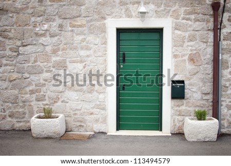 Green door in old stone house, Croatia