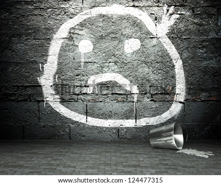 stock-photo-graffiti-wall-with-sad-face-