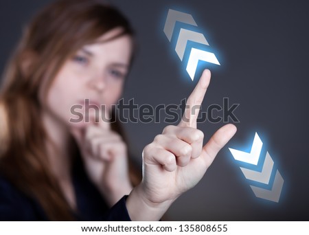 Woman\'s hand and zoom in gesture on touch screen