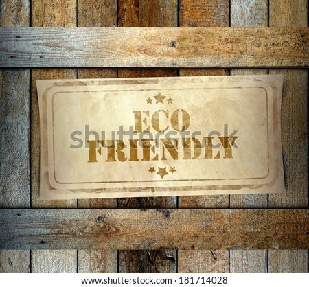 Stamp Eco friendly label on old wooden box