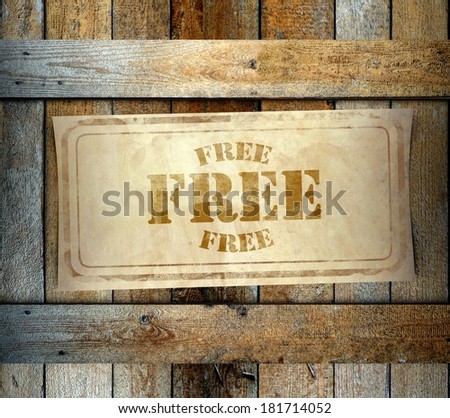 Stamp Free label on old wooden box