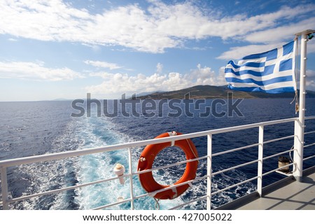 Ferry boat in Greece view on sea and islands with cruise ship trail