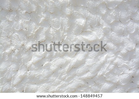 Rustic white washed rock wall