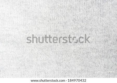 Creamy off-white wool knit work. Creamy off-white wool knit work full frame for warming artisan backdrop, background or texture.