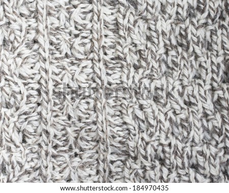 Creamy off-white wool knit work. Creamy off-white wool knit work full frame for warming artisan backdrop or background.