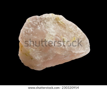 Raw pink rose quartz, SiO2 silica, isolated on black