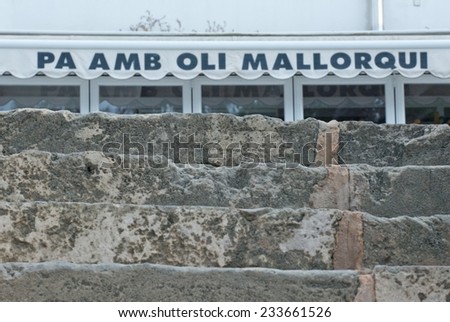 SANT ELM, MAJORCA, SPAIN - OCTOBER 30 2013: Restaurant sign and steps on October 30 2013 in Sant Elm, San Telmo, Mallorca, Balearic islands, Spain.