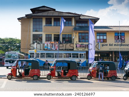 TANGALLE, SOUTHERN PROVINCE, SRI LANKA - DECEMBER 15, 2014: Tuk Tuk station Tangalle. Tuk tuk and bus station on December 15 2014 in Tangalle, Southern Province, Sri Lanka, Asia.