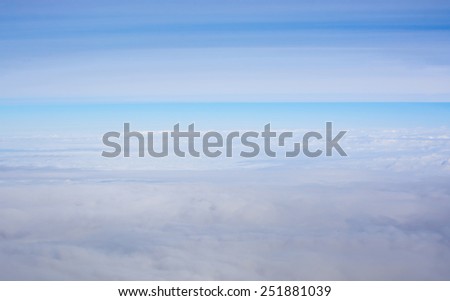Cerulean Sky and Cloud Cover in flight above Sweden in March.
