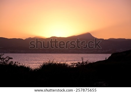 Beautiful sunset with sun effects, Mallorca, Balearic islands, Spain.