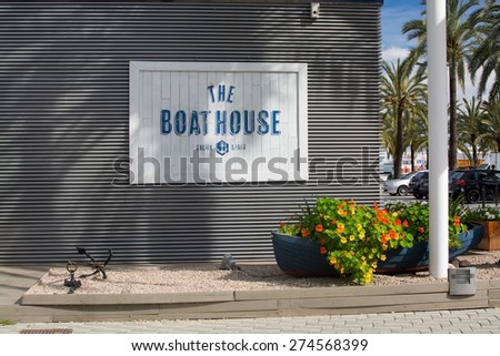PALMA DE MALLORCA, SPAIN - APRIL 19, 2015: The Boat House restaurant sign with flower decorations on April 19, 2015 in Palma de Mallorca, Balearic islands, Spain.