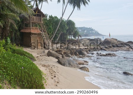 TANGALLE, SRI LANKA - DECEMBER 17, 2015: Sea food restaurant Think Club built by wooden sticks and buffalo dung on the Rocky Point beach on December 17, 2015 in Tangalle, Sri Lanka.
