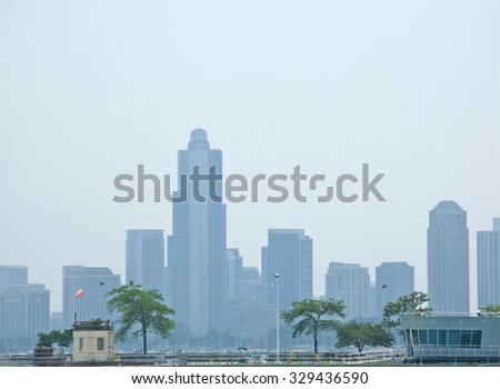CHICAGO, ILLINOIS, UNITED STATES - JULY 27, 2008: Chicago skyline in soft smog and haze on July 27, 2008 in Chicago, United States.