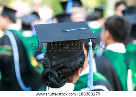 Crowd image of students at graduation ceremony from behind