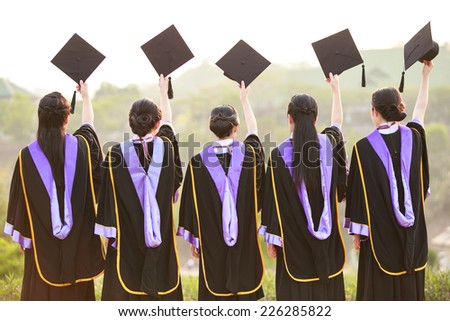 Crowd image of students at graduation ceremony from behind