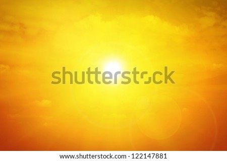 Sun background with clouds and flare