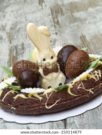 Easter cake decorated with chocolate eggs and bunny
