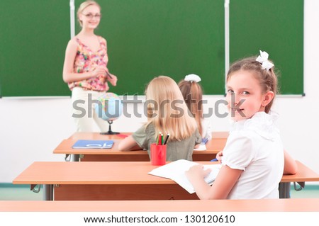 portrait of the girl in the class, the teacher tells the next school board
