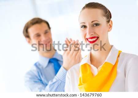 young successful business woman receiving congratulations from his colleagues