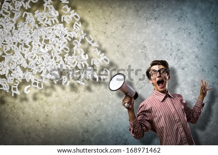 man shouts through a megaphone. from the megaphone off abstract symbols